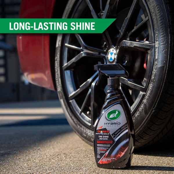 Graphene Acrylic Tire Shine is displayed against a backdrop of a shiny and glossy black tire. 